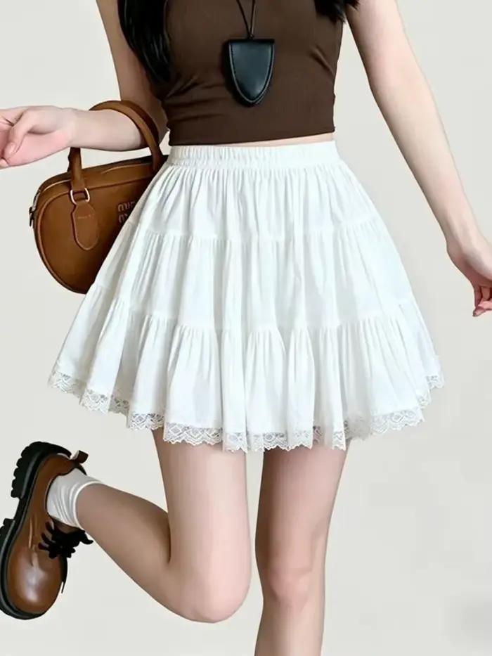 Jupe blanche Kawaii pour femme, taille haute, style chic décontracté, avec patchwork en dentelle, coupe trapèze, pour l'été, style preppy mignon