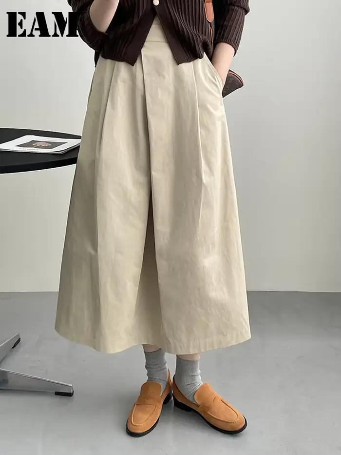 [EAM] taille haute abricot a-ligne irrégulière plissée élégante demi-corps jupe femmes mode marée nouveau printemps automne 2026 1DH3802