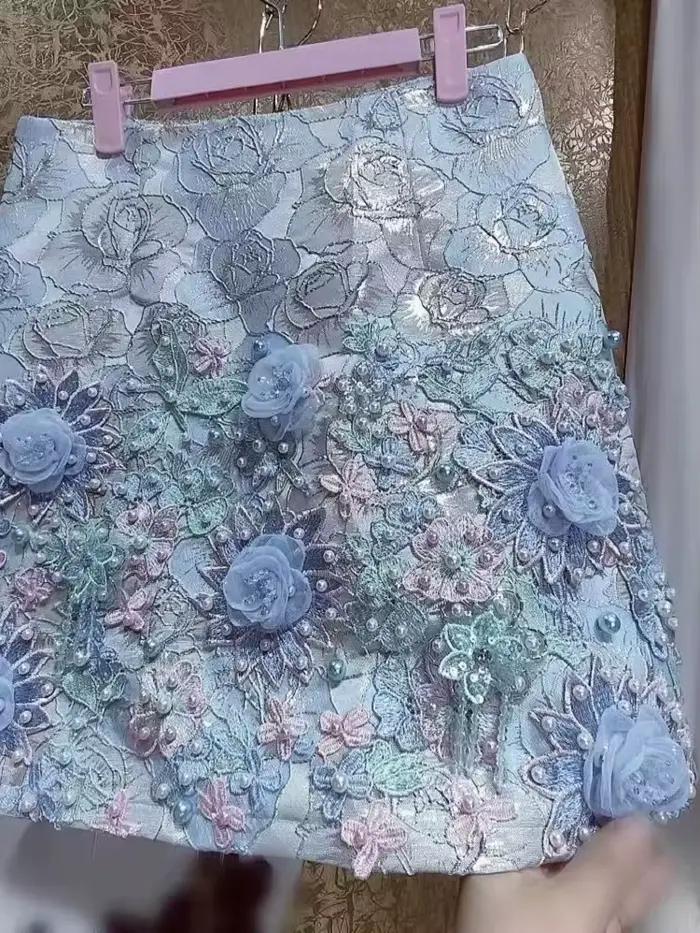 Design de luxe broderie fleurs 3D jupe courte perlée pour femmes pantalons courts jupes tendance mode Mini