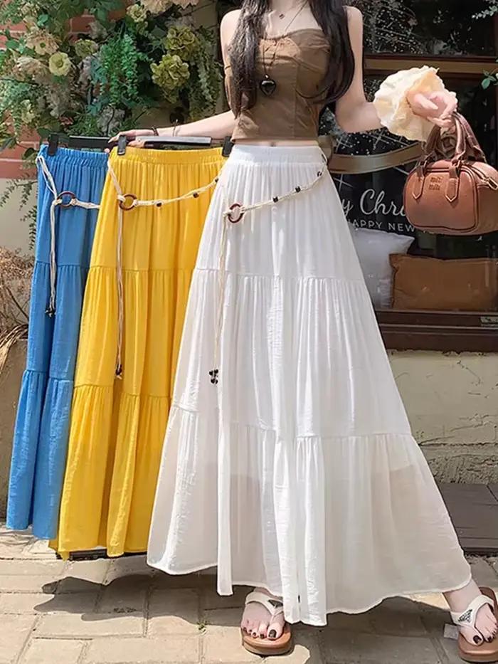 Jupe midi bohème en coton et lin pour l'été : jupe longue plissée fluide coupe trapèze avec effet amincissant et design dissimulant les hanches, idéale pour les vacances à la station balnéaire