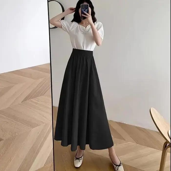 Jupes mi-mollet monochromes pour femmes