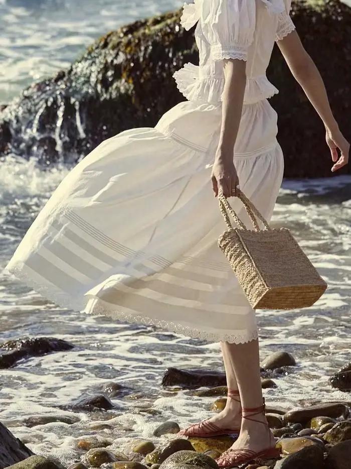 Jupe blanche bohème inspiration haute couture pour femmes mode printemps été coton fin mi-mollet silhouette élégante