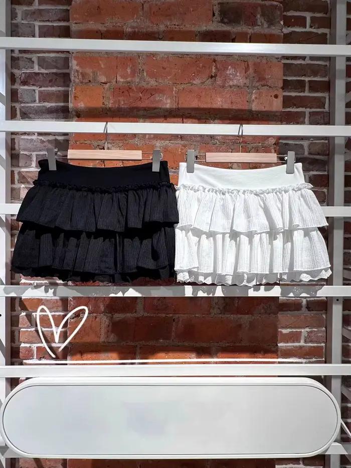 Nouvelles jupes mini blanches trapèze pour femmes en coton, décontractées, à taille haute élastique, style vintage et balletcore, mignonnes et élégantes