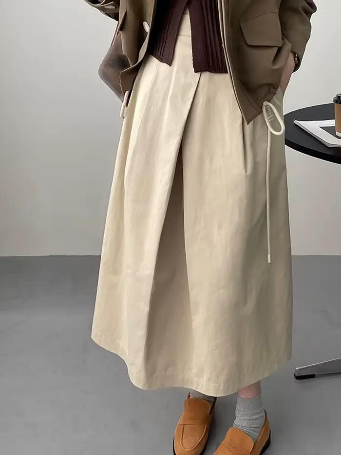 [EAM] taille haute abricot a-ligne irrégulière plissée élégante demi-corps jupe femmes mode marée nouveau printemps automne 2026 1DH3802