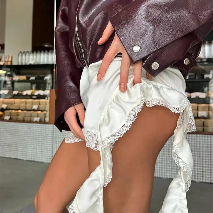 Femmes Sexy dentelle blanc asymétrique jupes mi-longues rue Chic Satin taille haute jupe mince été décontracté solide