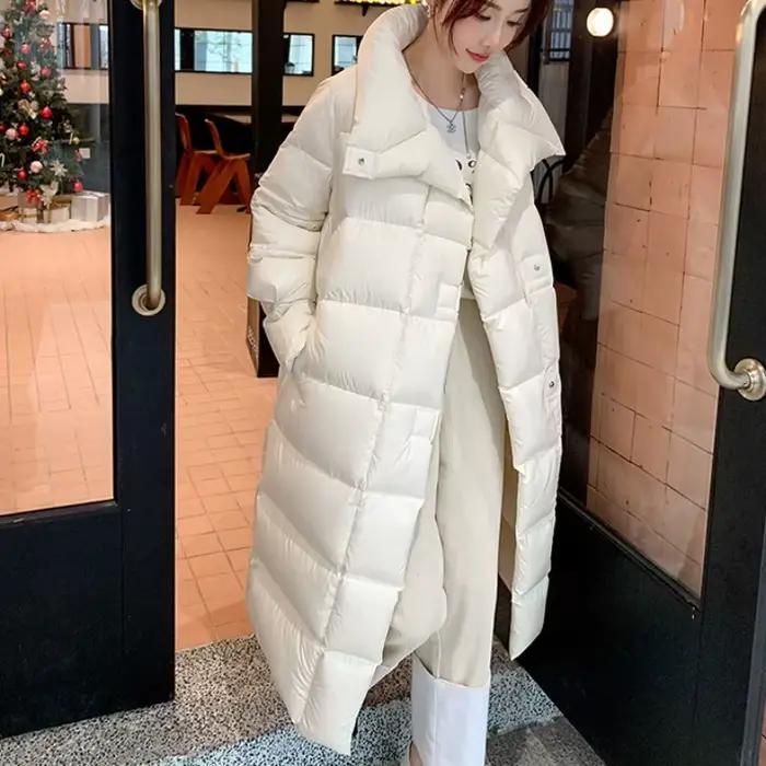 La longue veste coréenne rembourrée en coton est épaissie pour garder au chaud. Veste rembourrée en coton femme hiver en 2025