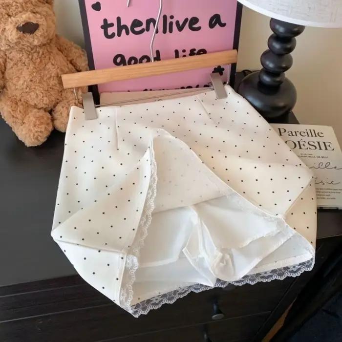 Mini-jupe élégante à taille haute à pois