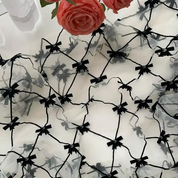 Lolita – tissu en dentelle avec nœud noir