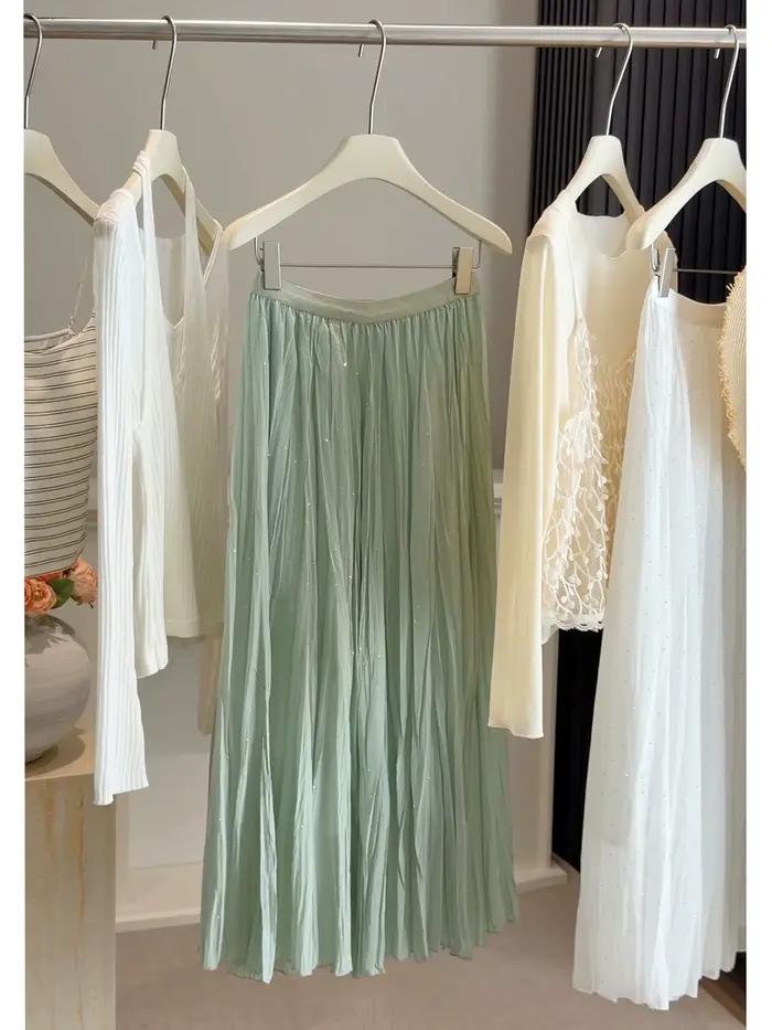 Jupe midi plissée en mousseline de soie avec strass pour femme
