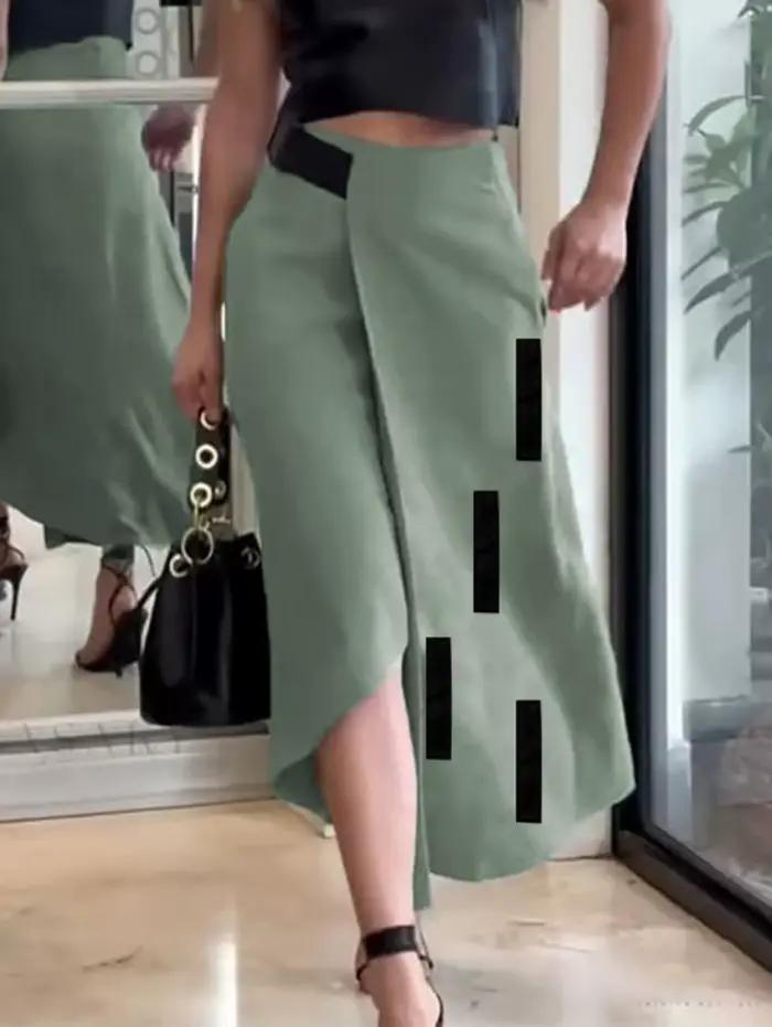 UOOZEE femmes mode asymétrique a-ligne jupes 2025 nouveautés poches à articulations fendues ample élastique taille haute jupe bas
