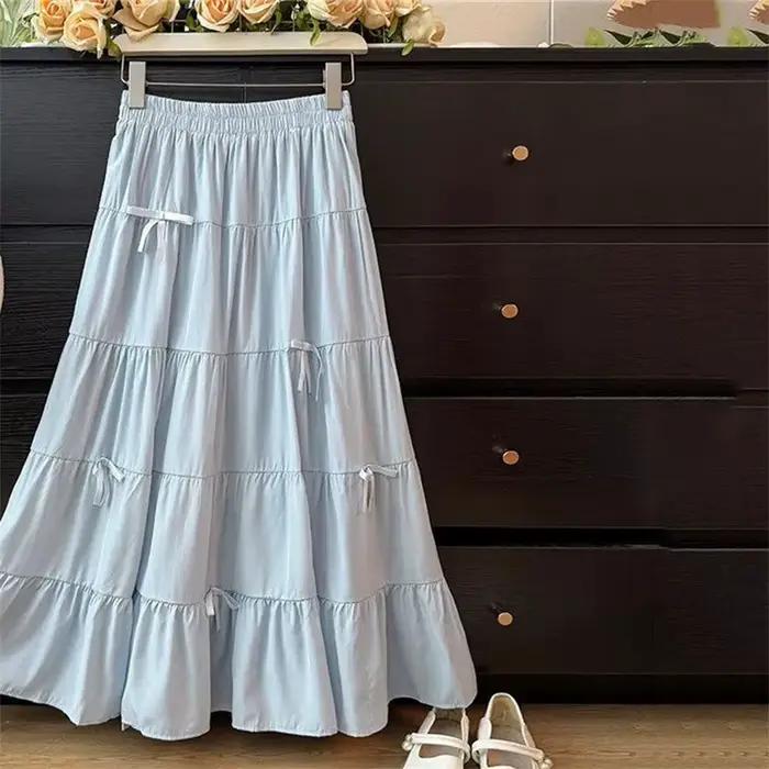 Jupe longue plissée bleue à nœud pour femme