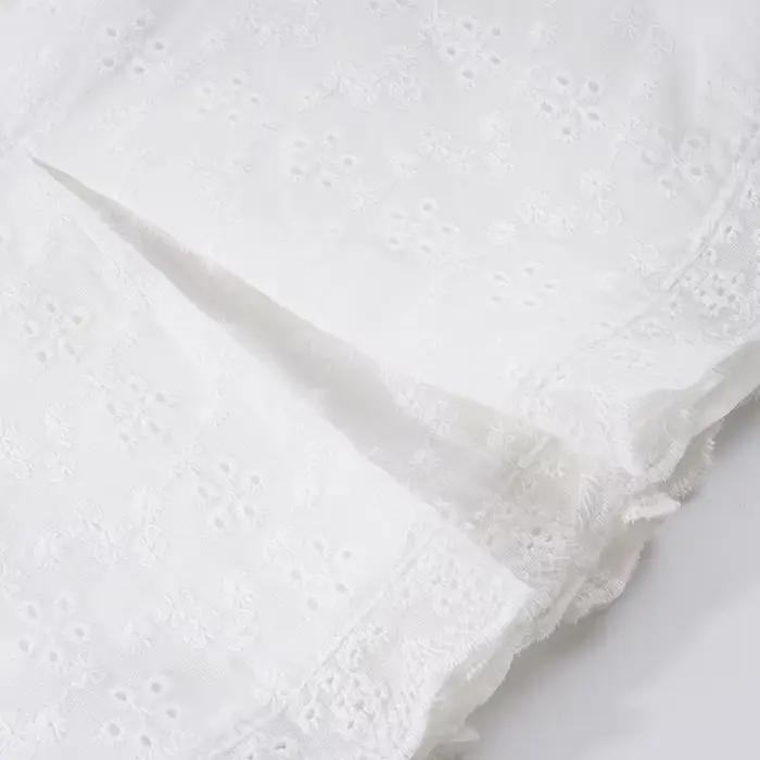 Jupe plissée jacquard taille basse avec cordon de serrage, jupe tissée blanche fine pour femme, collection été 2026