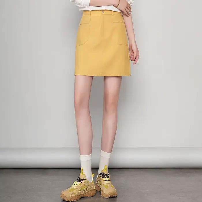 LOUIS YAO Jupes pour femmes Printemps 2026 Mini-jupe courte taille haute décontractée style professionnel avec boucle métallique