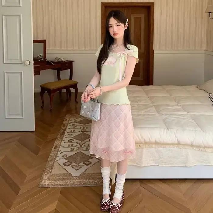 Jupe mi-longue rose à carreaux pour femme
