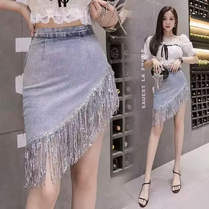 Paillettes glands jupe en jean 2025 été automne femmes paquet hanche bleu