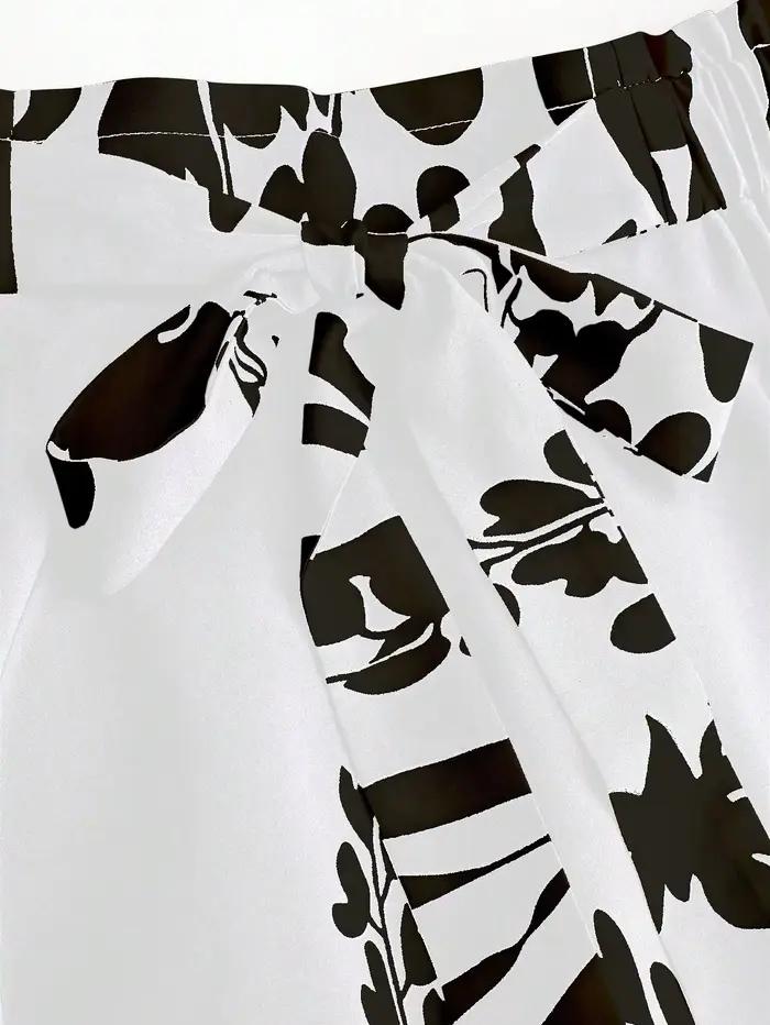 Jupe midi à imprimé floral taille haute pour femme - Jupe évasée noire et blanche avec ceinture élastique pour l'été et le printemps