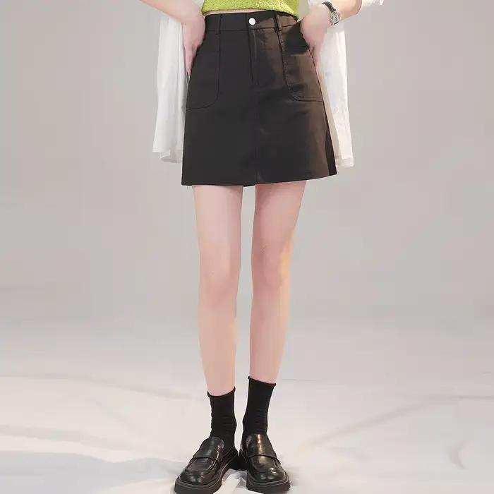 LOUIS YAO Jupes pour femmes Printemps 2026 Mini-jupe courte taille haute décontractée style professionnel avec boucle métallique