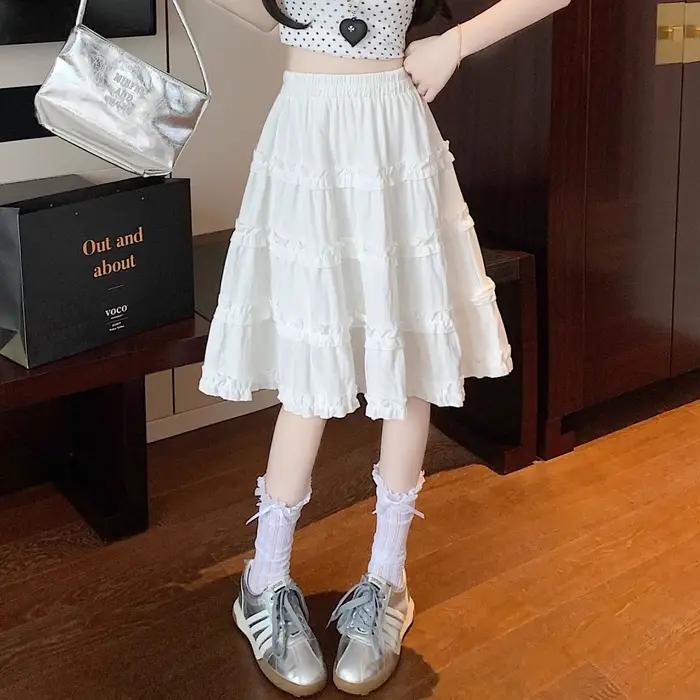 Jupe plissée blanche taille haute