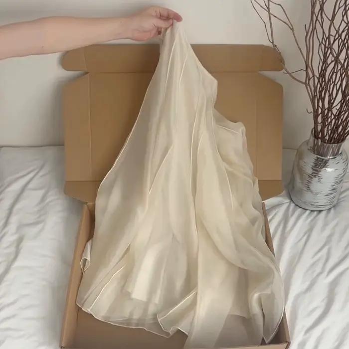 Recommandation de niveau Chao! Jupe mi-longue plissée trapèze abricot avec bordure en dentelle taille haute amincissante Nouveau style 2026