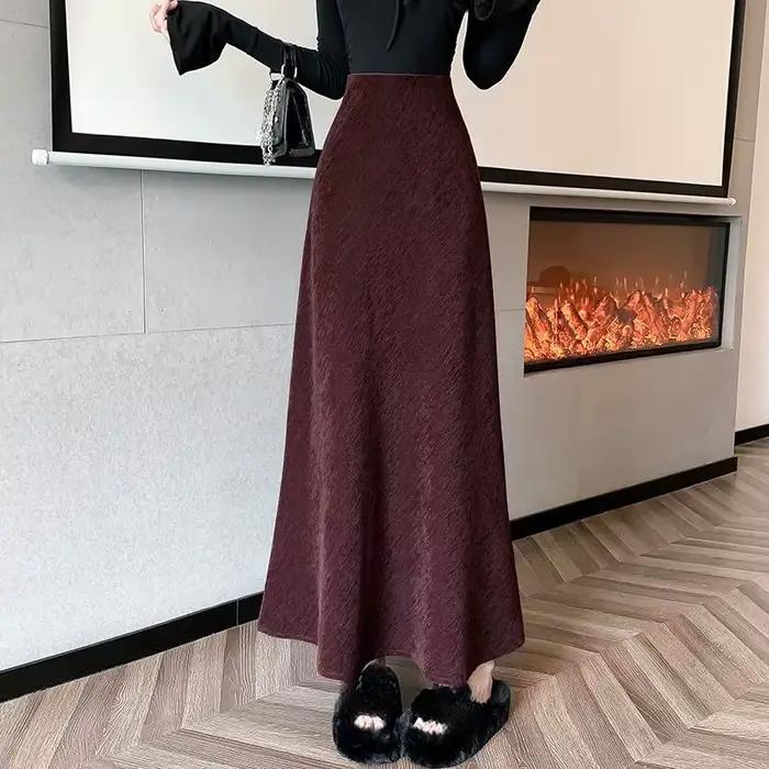 Demi-jupe trapèze noire taille haute, nouveau style 2025, jupe queue de poisson amincissante, jupe mi-longue d'automne et d'hiver