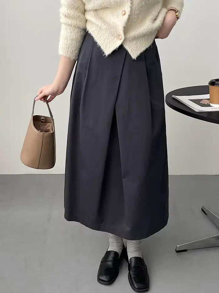 [EAM] taille haute abricot a-ligne irrégulière plissée élégante demi-corps jupe femmes mode marée nouveau printemps automne 2026 1DH3802