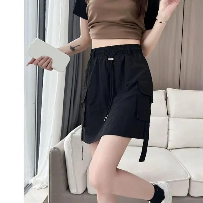 Jupe cargo ample taille haute à lacets et grandes poches, style streetwear pour femme, coupe mi-longue, style Spicy Girl