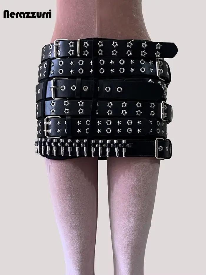 Mini jupe en simili cuir noire avec rivets et multiples ceintures pour femmes style punk et streetwear printemps été