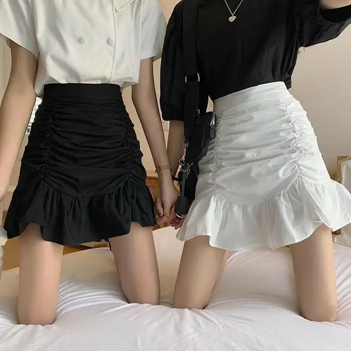 Jupe courte plissée taille haute polyvalente pour femme