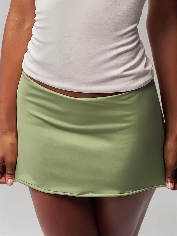 Taille basse à la mode élastique mince Mini Micro jupe a-ligne couleur unie