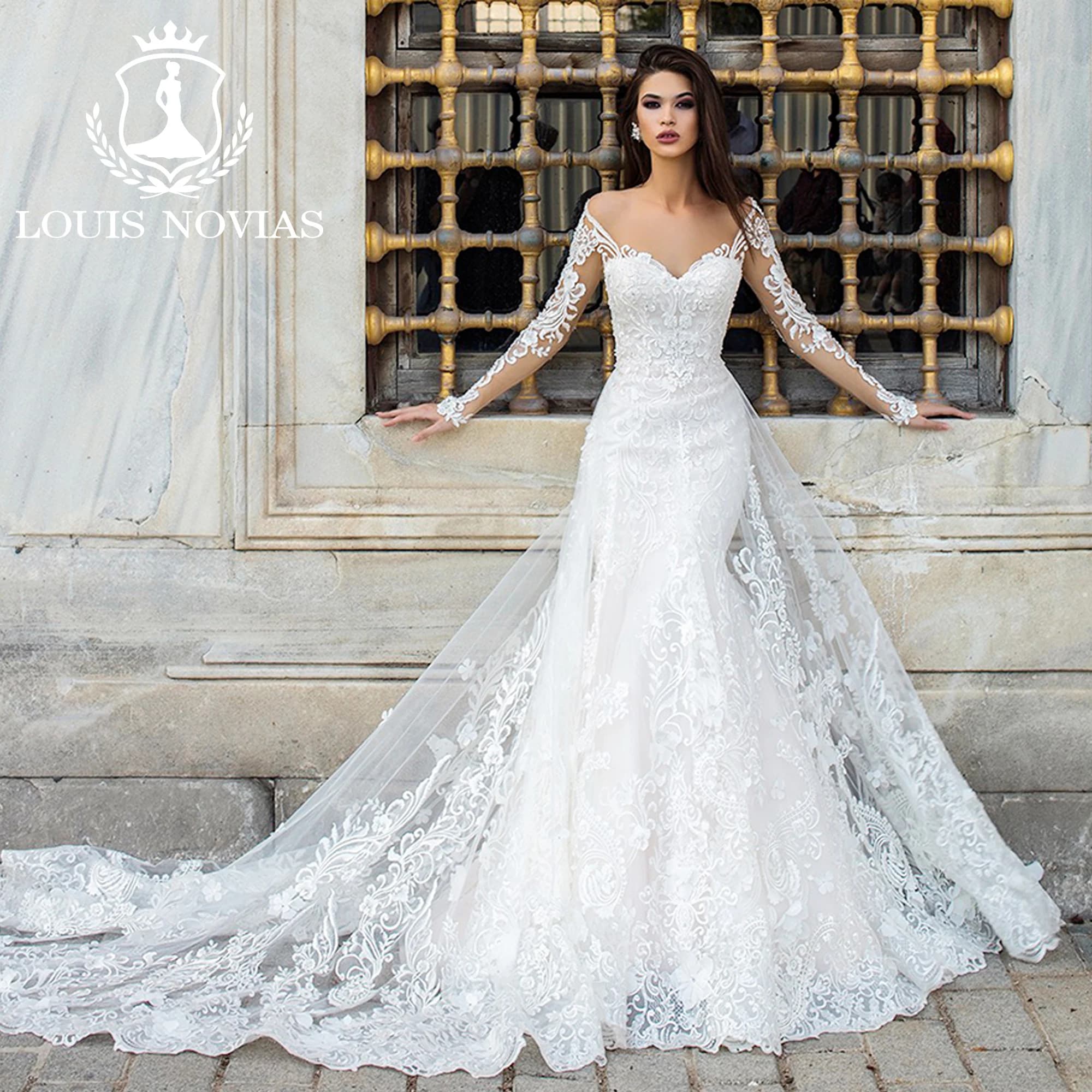 LOUIS NOVIAS Robe de mariée sirène à manches longues, fluide, avec décolleté cœur illusion et traîne