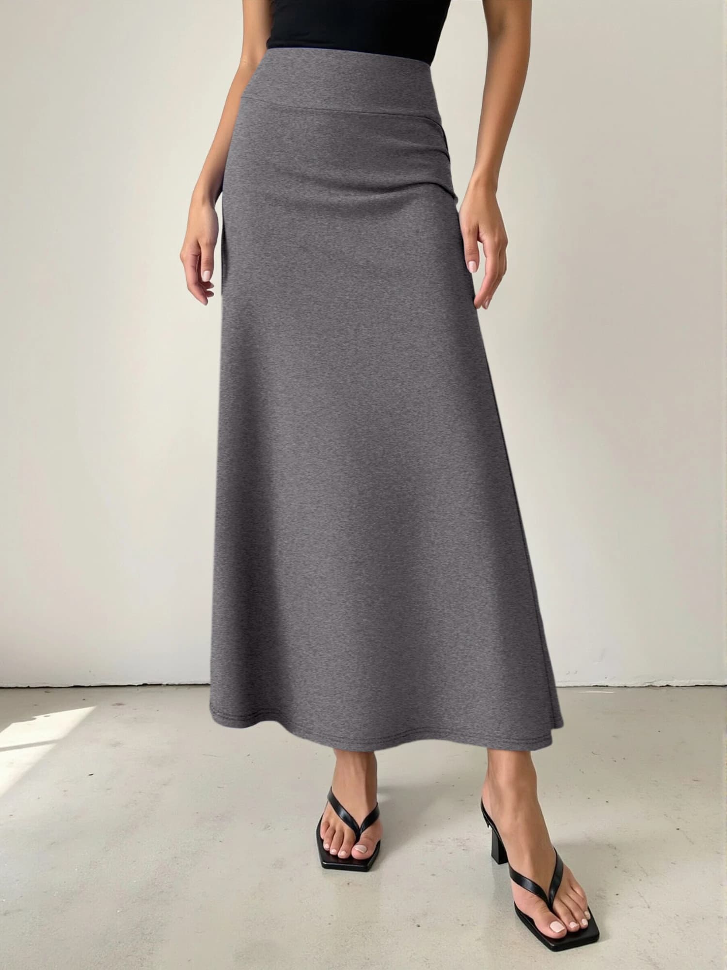 Jupe mi-longue pour femme, taille haute, coupe évasée, ourlet fluide, matière respirante, parfaite p