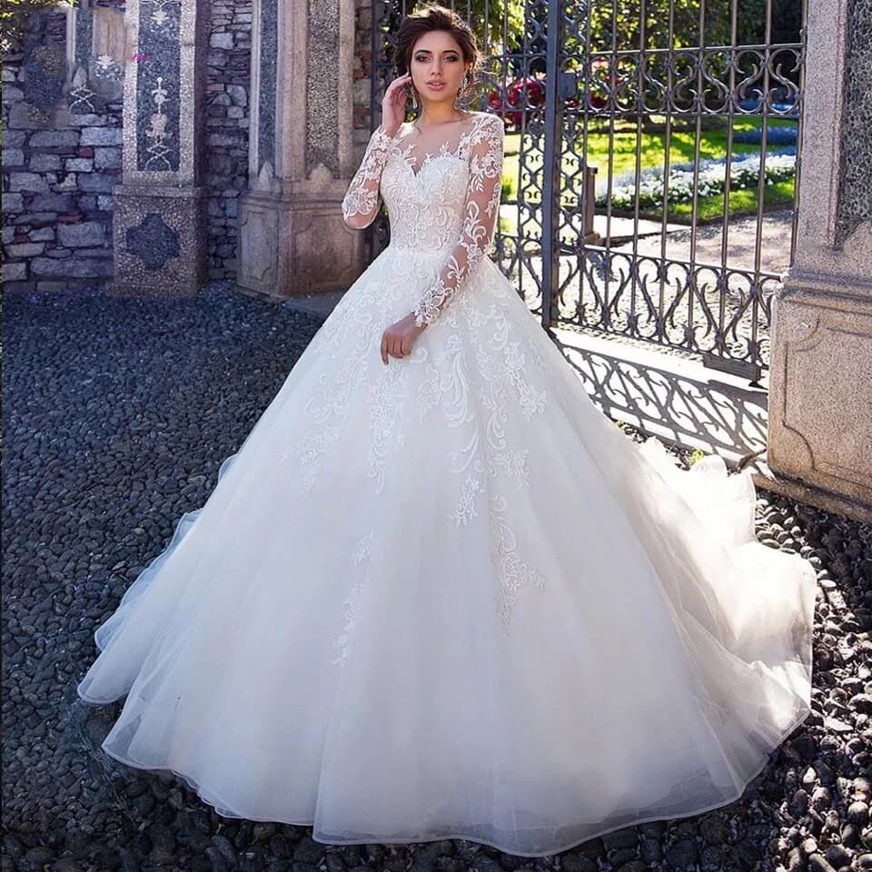 Robe de mariée blanche élégante à manches longues en dentelle, simple et raffinée, coupe ajustée à l