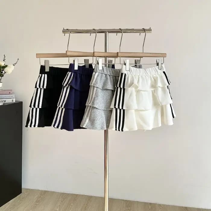 Jupe courte rayée douce pour femme, style été 2026, anti-exposition, jupe bouffante, taille élastiqu
