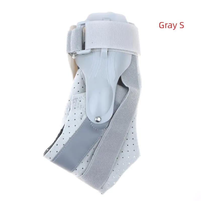 Attelle de cheville pour le sport avec stabilisateurs latéraux, offre un soutien fiable pour les ent