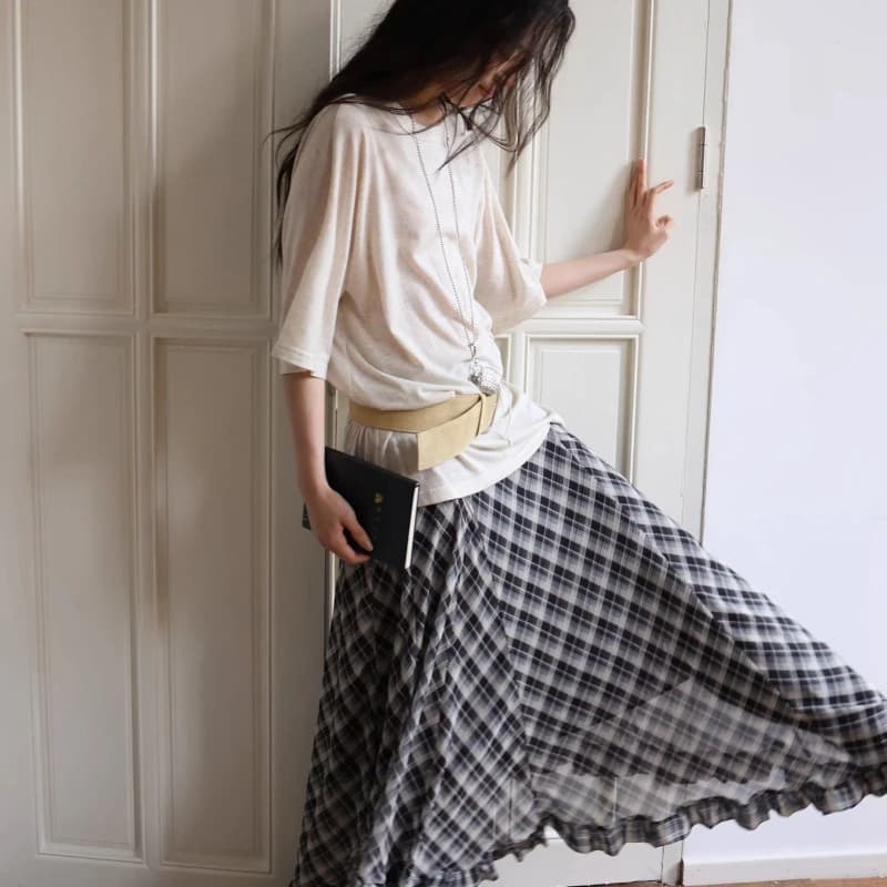 Printemps et été 2025 rétro Plaid avec taille irrégulière et oreille en bois une jupe avec longue ju