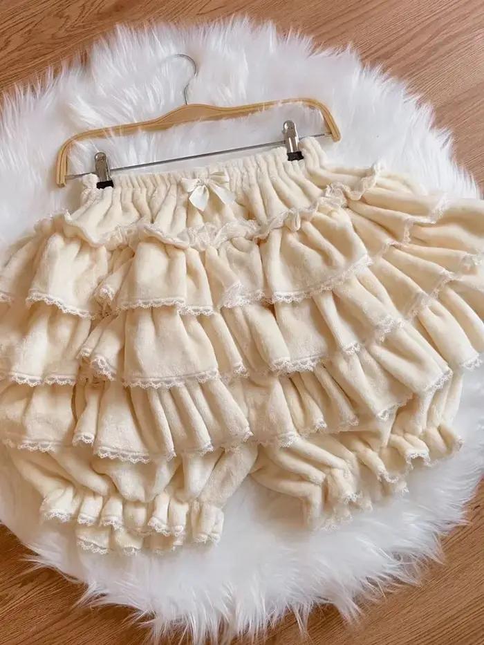 Nouveau rose japonais Kawaii Lolita jupe femmes nœud laine chaud doux Mini gâteau jupe femme corée p