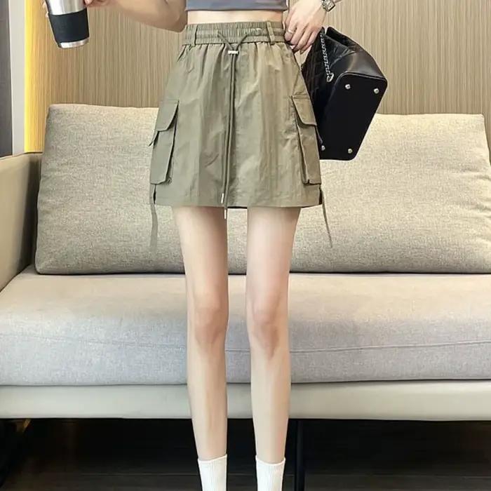 Jupe cargo ample taille haute à lacets et grandes poches, style streetwear pour femme, coupe mi-long