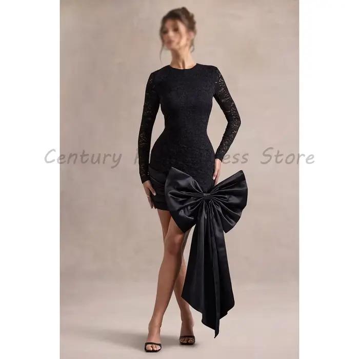 Robe de cocktail mini noire en dentelle, moulante, à manches longues et col rond, avec grand nœud en