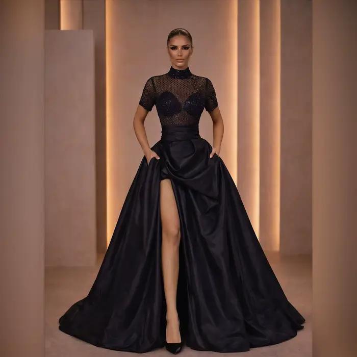 Jupe longue fendue noire taille haute coupe trapèze avec traîne et poches latérales – Jupe de soirée
