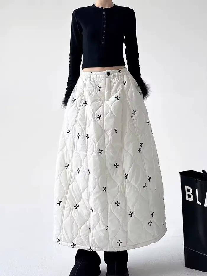 2025 hiver nouvelle jupe en duvet de coton jupe mi-longue pour les femmes en hiver avec chaleur d'in
