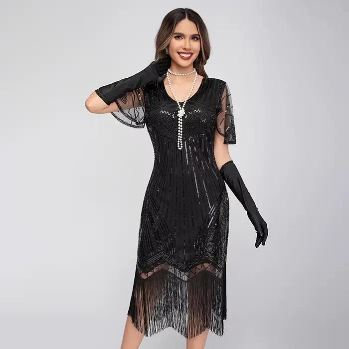 Robe Flapper Gatsby Vintage Années 20 Noire et Or à Paillettes Paon et Franges, Sans Manches, Style