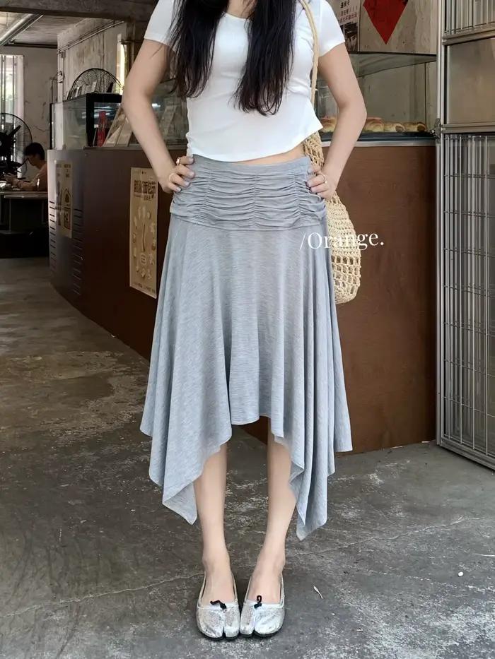 Jupe plissée asymétrique taille haute décontractée pour femme, collection Printemps-Été 2026, design
