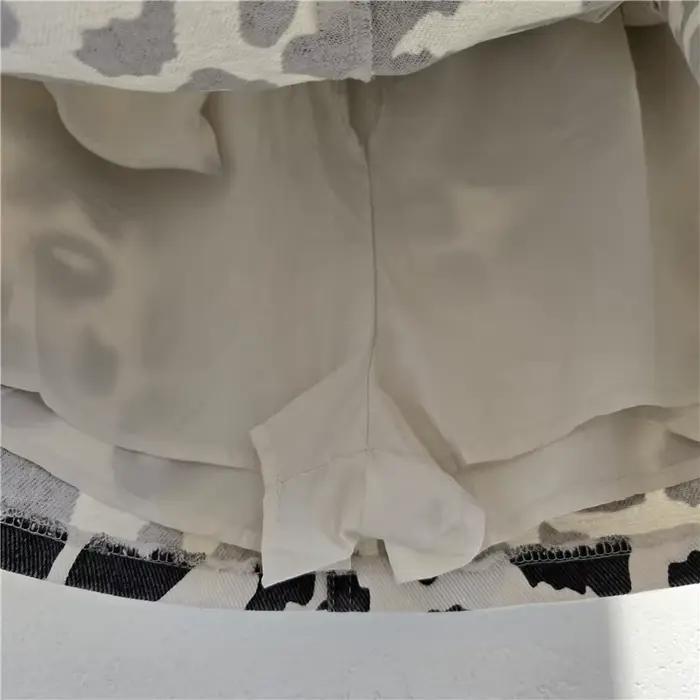 Jupe courte en jean imprimé léopard pour femmes, style décontracté américain, rétro, taille haute, coupe trapèze, mini-jupe