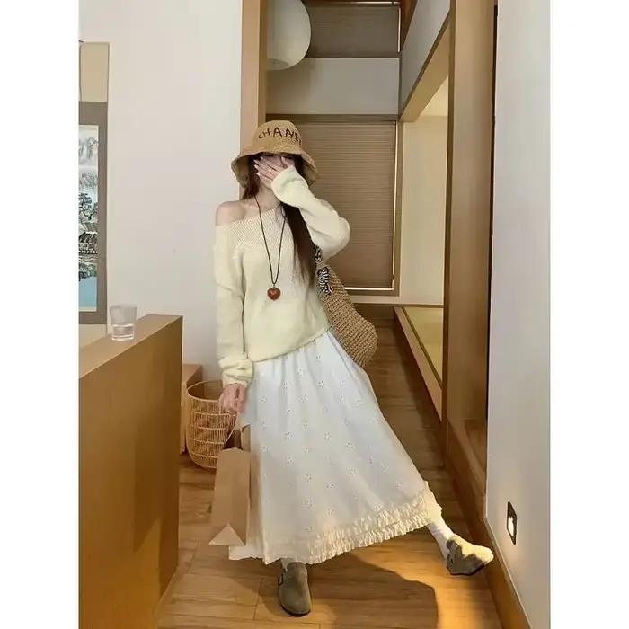 Jupe mi-longue brodée de fleurs creuses abricot français pour femmes, jupe mi-longue, Design tempérament, ligne a, printemps 2025