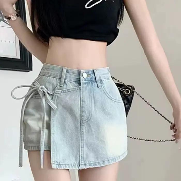 Mode noeud papillon a-ligne Denim jupes femmes coréen asymétrique fendu bleu jupe dames été nouveau basique taille haute