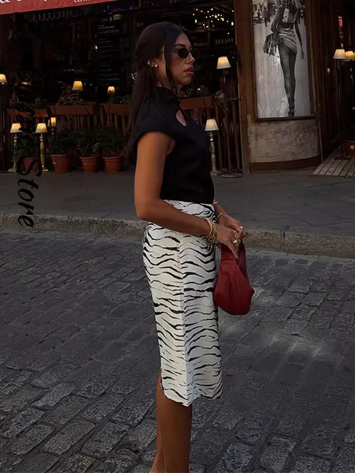 Jupe élégante à imprimé zèbre pour femmes, jupe midi droite vintage d'automne, nouvelle mode pour femmes, vêtements décontractés de rue 2026