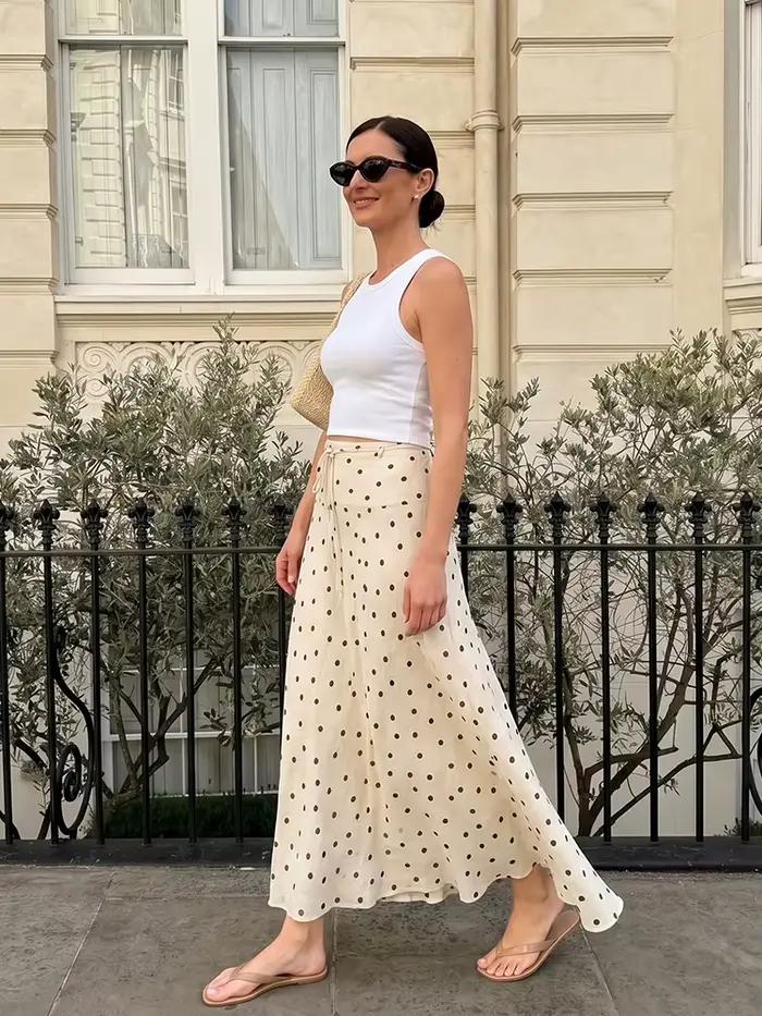 Jupe évasée à volants style français à pois blancs pour femme, taille haute avec cordon de serrage, coupe fluide en A, idéale pour l'été, les vacances, la plage ou le quotidien