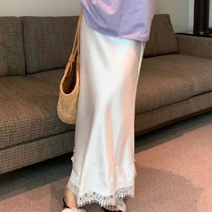Jupe sirène en tissu satiné effet soyeux avec ourlet en dentelle pour femmes silhouette droite confortable et élégante pour occasions spéciales et tenues quotidiennes