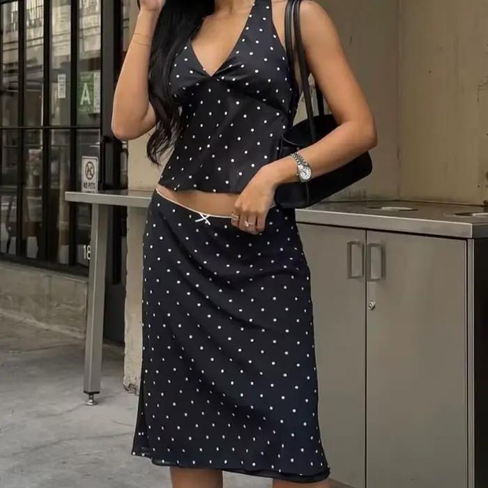YENKYE-Jupe trapèze à pois pour femme, longueur genou, vintage, noir, blanc, sexy, taille basse, vacances, été, 2025