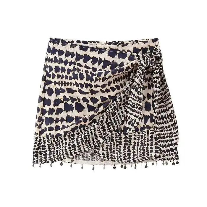 Mini jupe imprimée tendance avec Double rabat et perles croisées